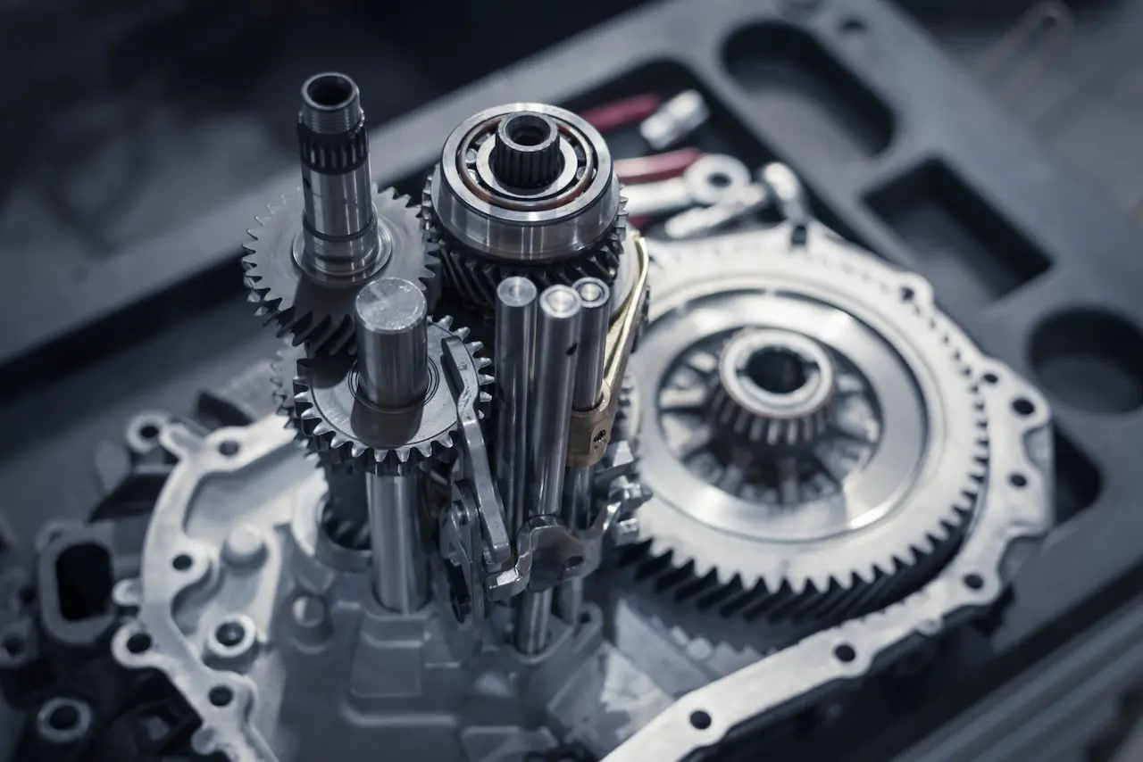 Close-up view of a gearbox showcasing intricate gears and mechanical components in detail.