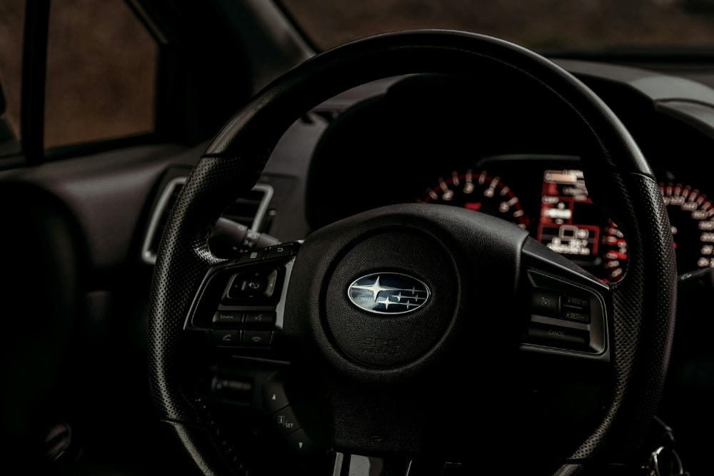 the steering wheel and dashboard of a car. Steering Repair In Colorado Springs OH At Express Auto Repair