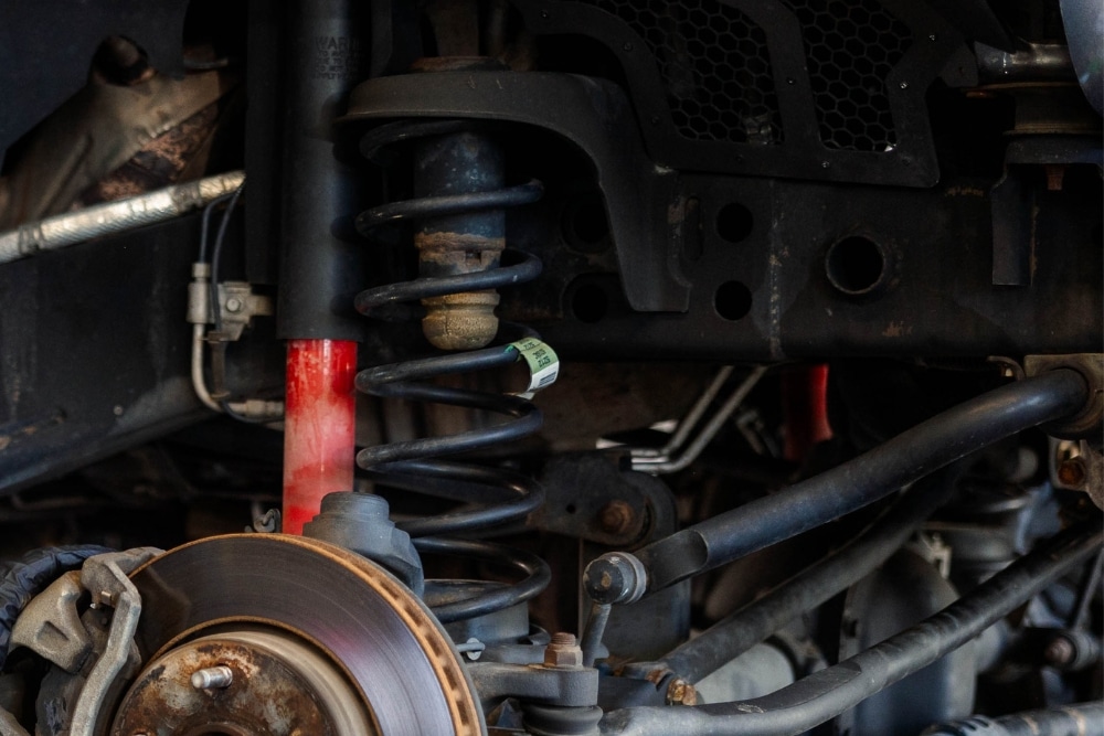 a close up of a car's suspension or front wheel. Suspension Repair In Colorado Springs OH At Express Auto Repair