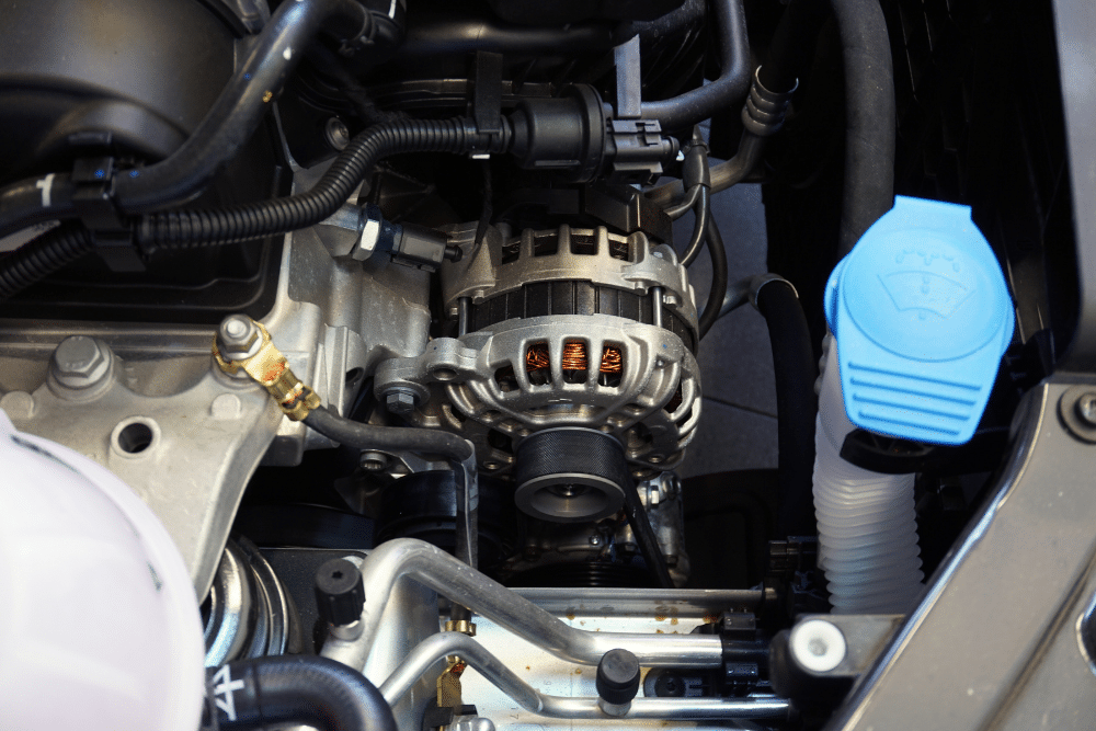 A/C and Alternator Check, Alternator Check in Colorado Springs CO At Express Auto Repair. Close-up of a vehicle alternator