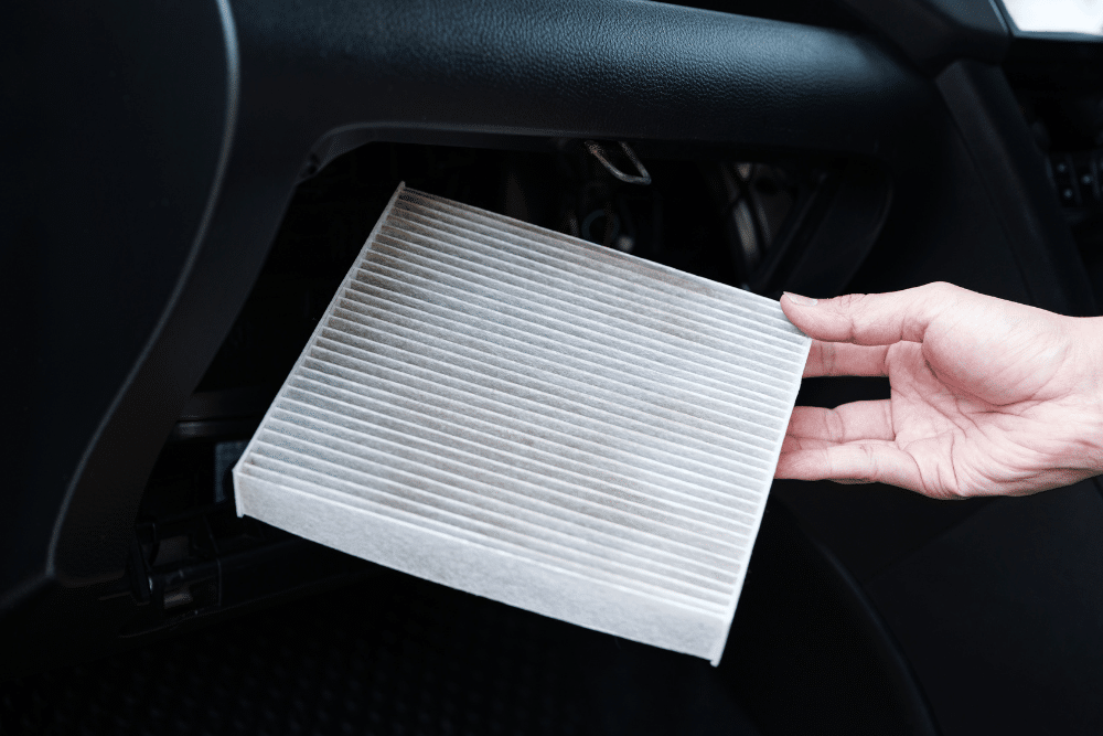 Cabin Air Filter Replacement in Colorado Springs CO At Express Auto Repair. Close-up view of a cabin air filter